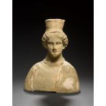 A GREEK TERRACOTTA FEMALE BUST, SICILY, circa 4th century B.C., moulded hollow with opening to