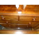 A LATE 19TH CENTURY MAHOGANY CHEST OF DRAWERS having rectangular top with two inline and three