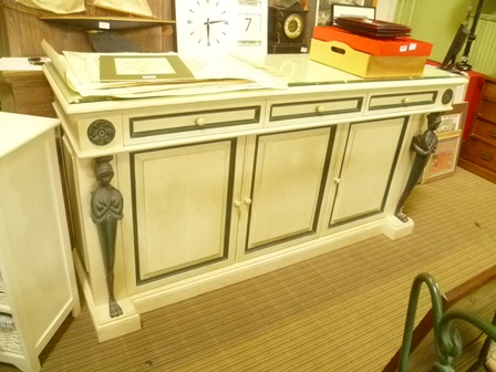 A DECORATIVELY PAINTED SIDEBOARD UNIT in the classical revival style, having plain rectangular top