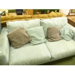 A BLUE SUEDE EFFECT UPHOLSTERED DOUBLE SOFA BED with contrasting scatter cushions