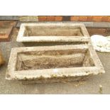 A PAIR OF CAST CONCRETE RECTANGULAR PLANTERS with lattice work design