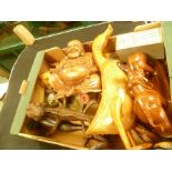 A BOX CONTAINING A SELECTION OF CARVED FIGURINES both human and animal, together with A METAL