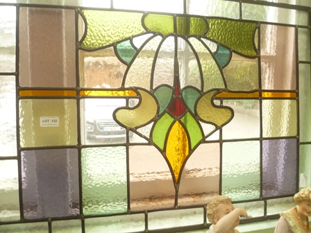 A STAINED & LEADED GLASS PANEL