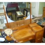 A MID 20TH CENTURY DRESSING TABLE, having circular adjustable mirrored back, single central drawer