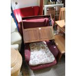 TWO 1950S RED UPHOLSTERED ARMCHAIRS by 'Howard Keith'