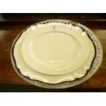 THREE POTTERY OVAL SERVING PLATTERS one having admiralty crest