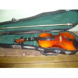 A BLACK VINYL CASED CHILD'S VIOLIN AND BOW