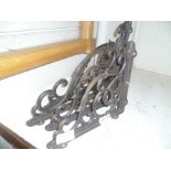 TWO PAIRS OF CAST METAL BRACKETS