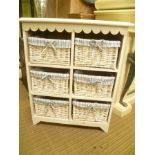 A WHITE PAINTED BOX FRAME FOR SIX WOVEN WICKER BASKETS with striped liners
