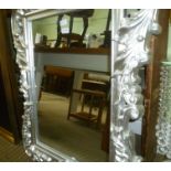 A LARGE ANTIQUE DESIGN SILVER FRAMED RECTANGULAR WALL MIRROR