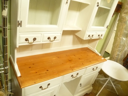 A PART PAINTED SOFTWOOD TWO PIECE KITCHEN DRESSER with twin shelved plate rack back, with glazed