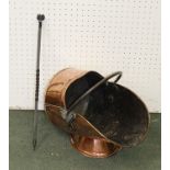 A 19TH CENTURY COPPER COAL SCUTTLE with iron work handles impressed war department, together with