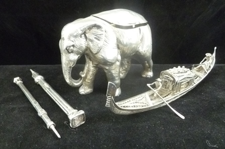 A LATE 19TH CENTURY CONTINENTAL WHITE METAL BOX in the form of an elephant, hinged lid to back,