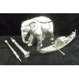 A LATE 19TH CENTURY CONTINENTAL WHITE METAL BOX in the form of an elephant, hinged lid to back,