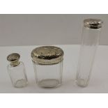 AN EDWARDIAN SILVER LIDDED FACET GLASS DRESSING TABLE JAR the lid Birmingham 1907, together with TWO