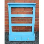 A VICTORIAN DESIGN PINE WALL RACK fitted shelf and two drawers to the base, in distressed blue paint