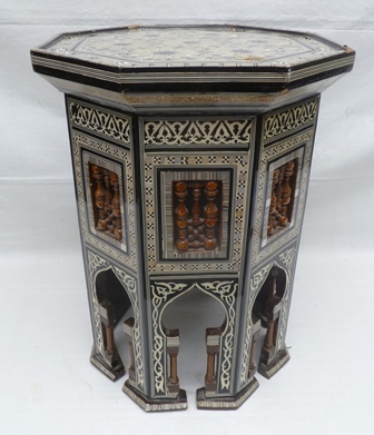 A 20TH CENTURY MOORISH SIDE TABLE OF OCTAGONAL FORM, with turned wood panels and Mihrab base,