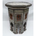 A 20TH CENTURY MOORISH SIDE TABLE OF OCTAGONAL FORM, with turned wood panels and Mihrab base,