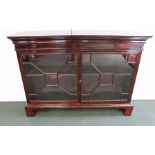 A 19TH CENTURY MAHOGANY CABINET, having two astragal glazed doors, on bracket feet, 116cm