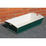 A PAINTED PINE RECTANGULAR TROUGH with pierced handles.