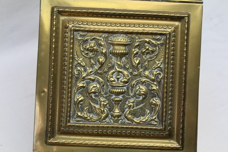 AN EDWARDIAN BRASS COAL PURDONIUM, the embossed hinged front panel reveals an interior liner, with - Image 3 of 6