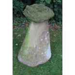 A TRADITIONAL DESIGNED TWO PIECE STADDLE STONE