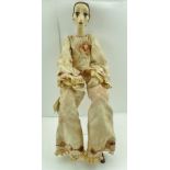 A "JULIA HILLS", PIERROT ART DOLL, in an antique fabric costume with leather boots, 58cm tall, bears