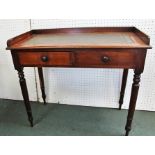 A 19TH CENTURY MAHOGANY WRITING TABLE with plain gallery back, tooled leather writing surface, over