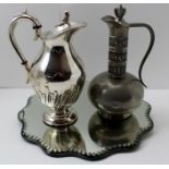 A "HAUGRUD" OF NORWAY PEWTER LIDDED JUG, together with a silver plated lidded JUG and a shaped table