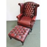 A RED LEATHER WING BACK EASY CHAIR, with button back, on cabriole legs, together with a matching