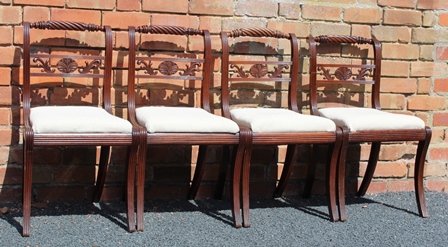 A SET OF FOUR 19TH CENTURY MAHOGANY REGENCY DESIGN SINGLE DINING CHAIRS, having Trafalgar rope twist