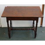 A JACOBEAN DESIGN OAK SIDE TABLE raised on bobbin turned supports with plain stretchers