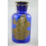 A LARGE COBALT BLUE BLOWN GLASS STORAGE JAR with gilded Chinoiserie decoration, complete with