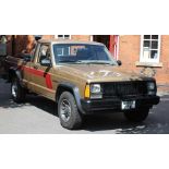 A JEEP COMANCHE PICK-UP SPORT TRUCK, left hand drive, registration G992 ABW, 4.0 litre petrol,