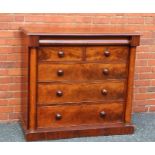 A 19TH CENTURY MAHOGANY CHEST OF DRAWERS, having shaped frieze drawer over two short and three