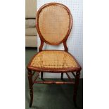 A VICTORIAN YEW WOOD FRAMED SINGLE CHAIR with re-bergered back and seat, having ring turned fore