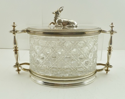A LATE VICTORIAN BISCUIT CANISTER having silver plated mounts on an oval cut glass body - Image 2 of 4
