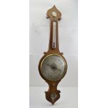 A LATE 19TH CENTURY MAHOGANY CASED ONION TOP WHEEL BAROMETER, silvered dial, 25cm diameter with