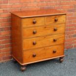 A 19TH CENTURY MAHOGANY FINISHED BEDROOM CHEST OF DRAWERS of small proportions, having rounded plain