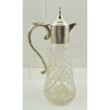 CHARLES S. GREEN & CO. A VICTORIAN DESIGN SILVER MOUNTED CLARET JUG, hinged cover and scrolling