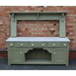 A VICTORIAN DESIGN GREEN PAINTED PINE DRESSER BASE, with three drawers flanked by two box