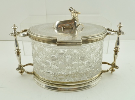 A LATE VICTORIAN BISCUIT CANISTER having silver plated mounts on an oval cut glass body - Image 3 of 4