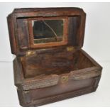 AN AMERICAN TRAMP ART CASKET circa 1900, the hinged cover with mirror to inside, fitted re-claimed