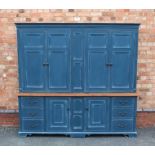 A GEORGIAN DESIGN PAINTED PINE HOUSEKEEPER'S CUPBOARD, having dentil frieze over four panelled doors