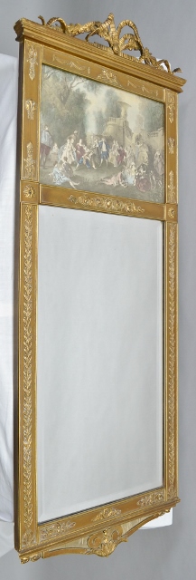 A FRENCH EMPIRE DESIGN GILT FRAMED PIER MIRROR, with ribbon swag crest upper portion inlaid with a