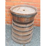 A VICTORIAN COOPERED OAK BUTTER CHURN, banded, with cover, 67cm high