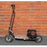 AN ENGINEER BUILT METAL FRAMED SCOOTER having two stroke petrol engine on chain driven rear wheel,