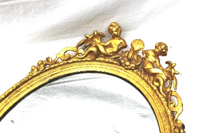 A PAIR OF 19TH CENTURY GILT GESSO OVAL FRAMED WALL MIRRORS with Mer-Putti crests and twin candle - Image 2 of 7