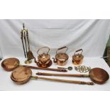 A SELECTION OF DOMESTIC BRASS AND COPPER WARES to include; warming pans, companion set, tea