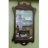 A 19TH CENTURY FRET CUT WALL MIRROR